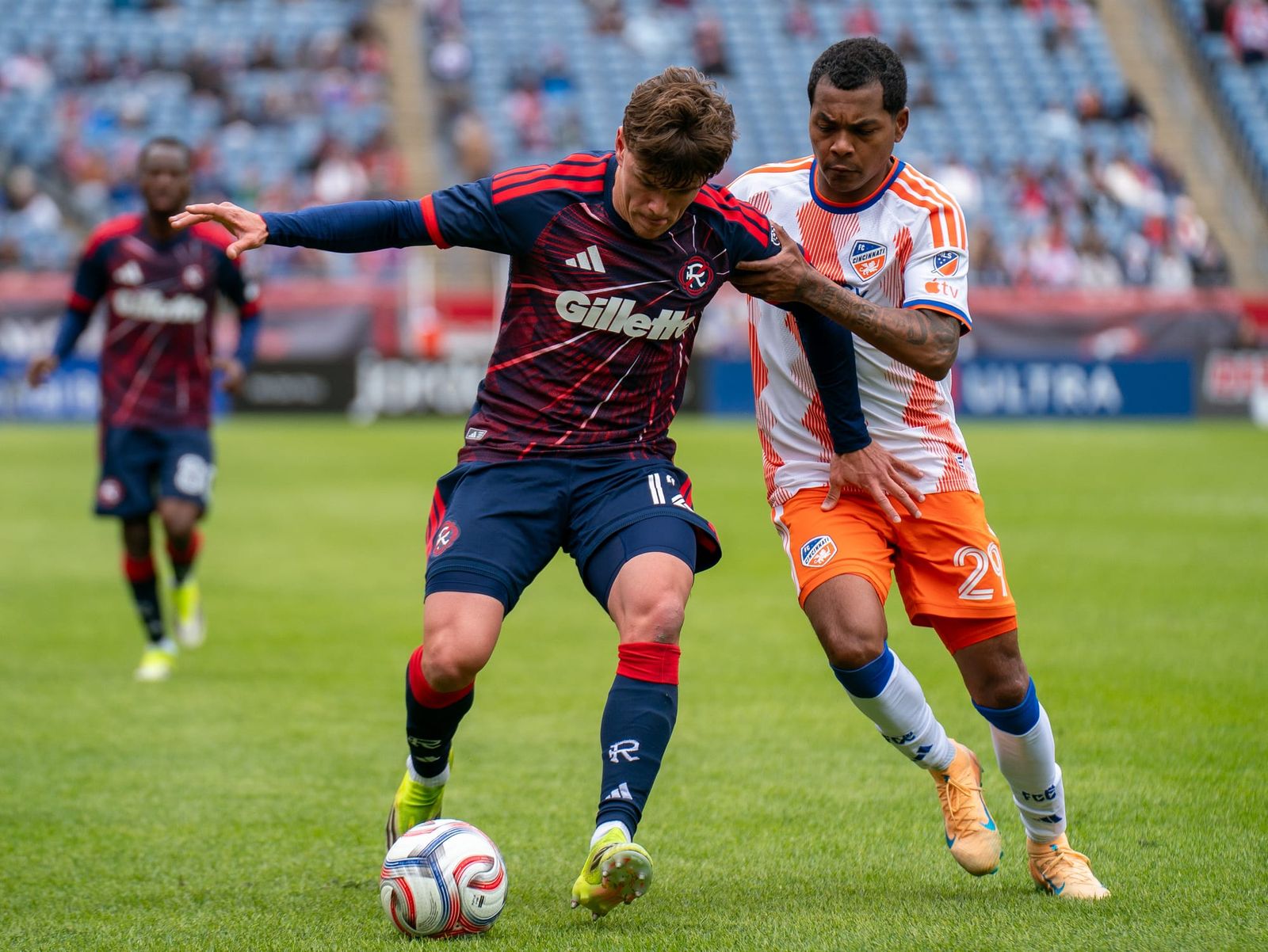 Ilay Feingold shields an opponent from the ball at Gillette Stadium