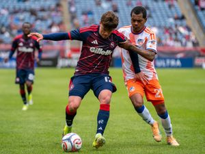 Ilay Feingold shields an opponent from the ball at Gillette Stadium