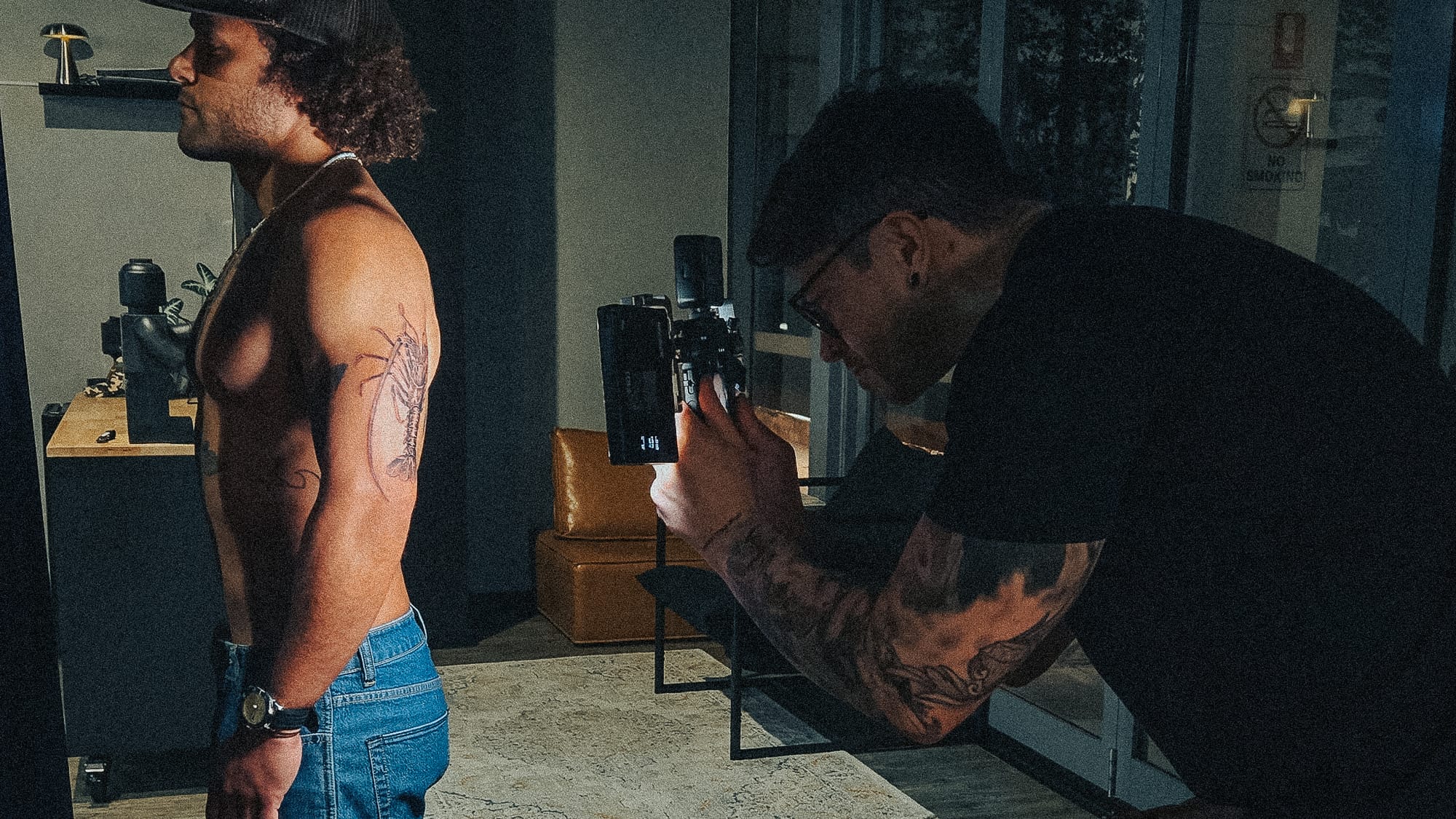 Vitor shooting a client's finished piece. Photo: supplied by Amanda / LiveArt Tattoo