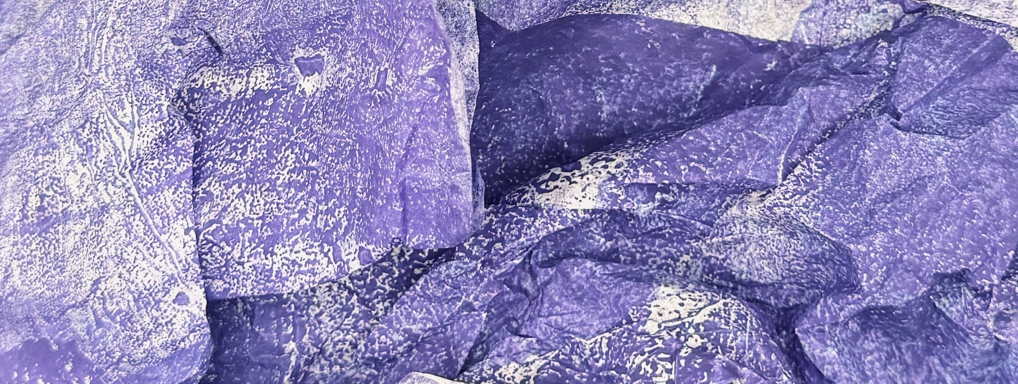 Rice paper, painted purple, crumpled, and folded