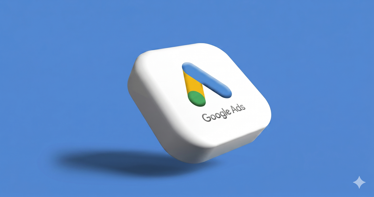 A stylized 3D Google Ads icon: a white cube with the multi-color 'A' logo and "Google Ads" text, floating against a blue background.