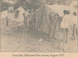 yellowed newspaper clipping with a photo of some large tents and men standing near them, labeled Tent City, 22nd and Vine Streets, August 1971