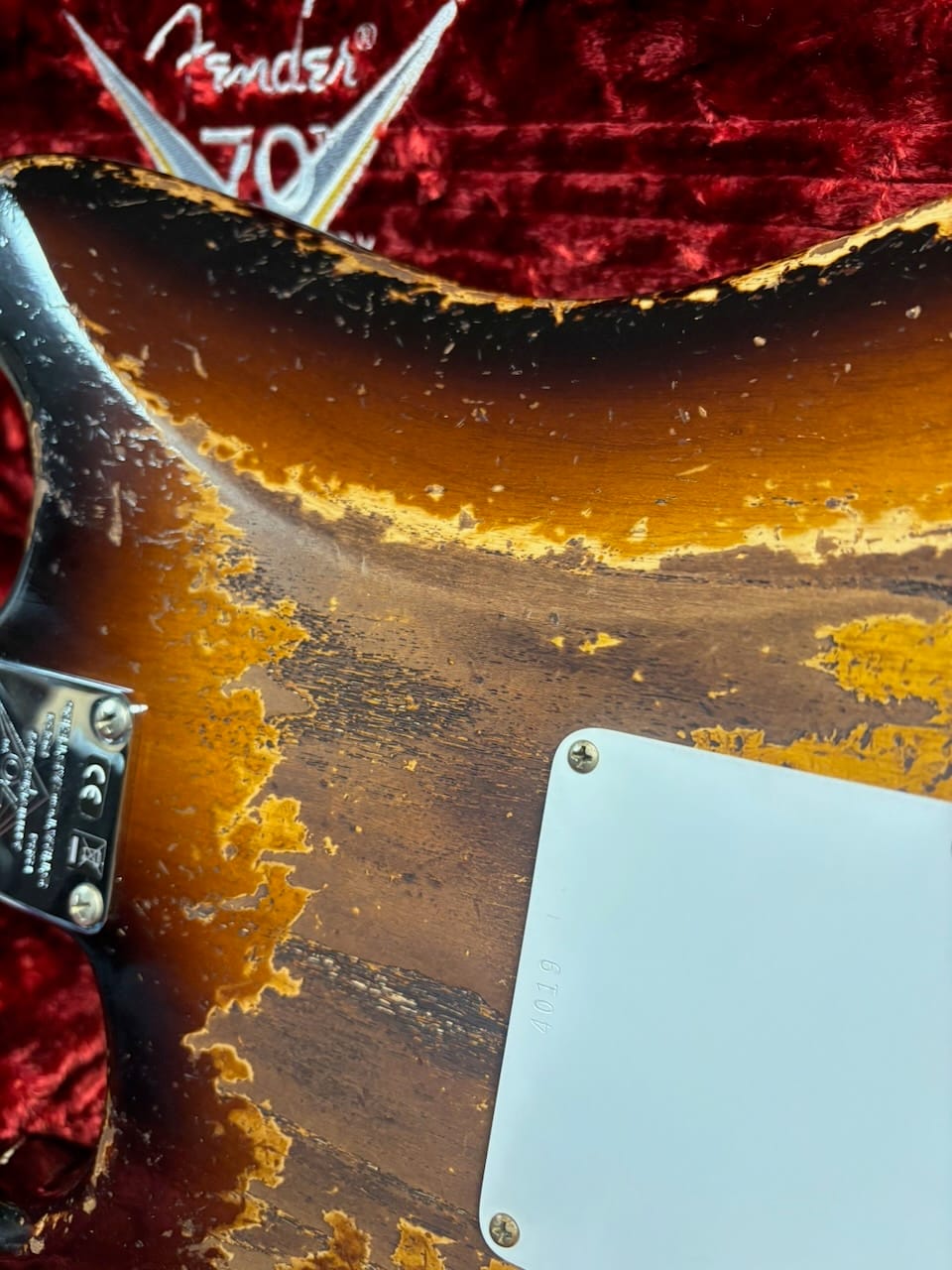 Note: this Fender Custom Shop 70th Anniversary Strat has the serial number 4019 - imprinted on the rear cavity plate.