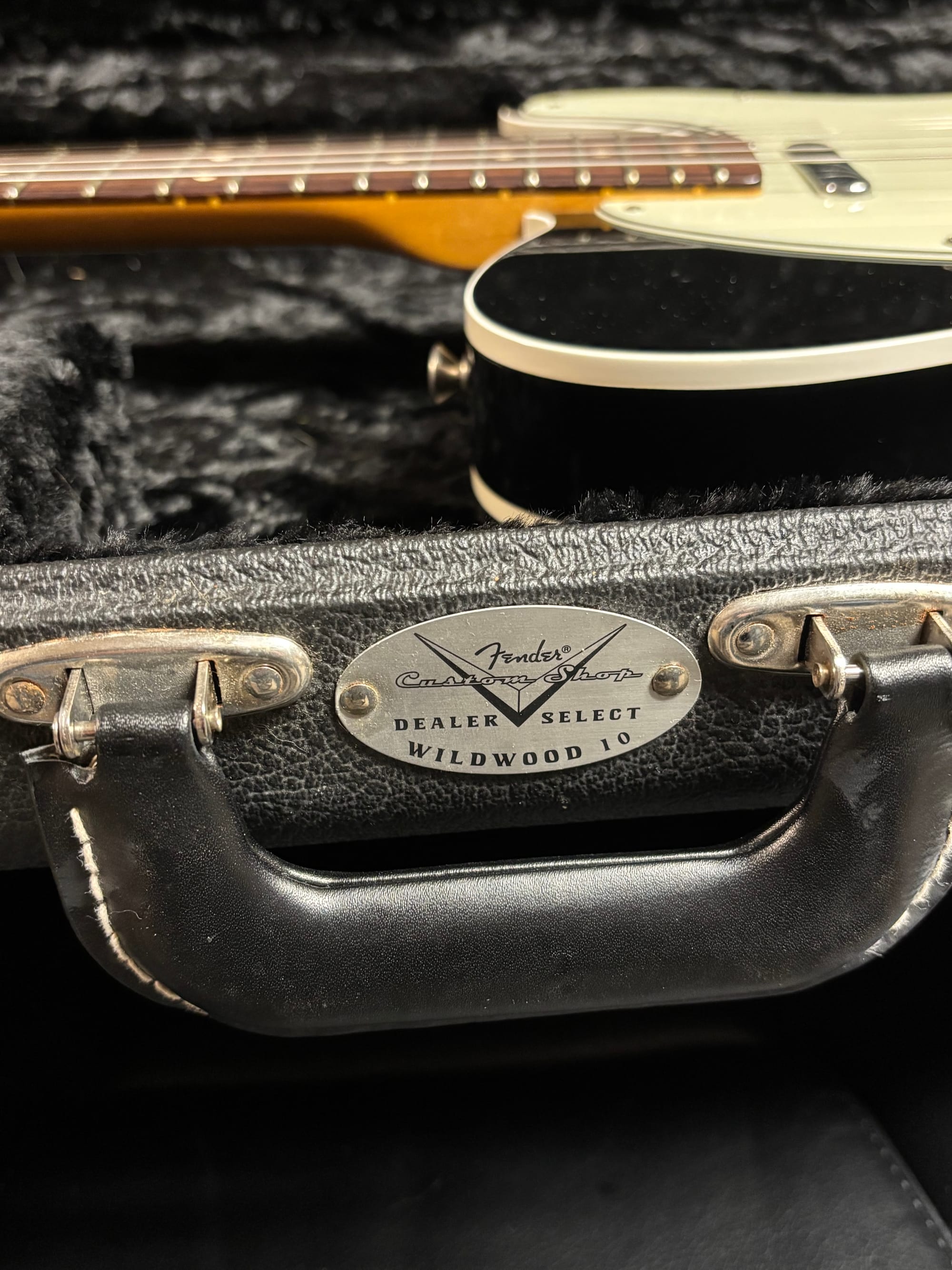 Photo of Wildwood guitar case badge