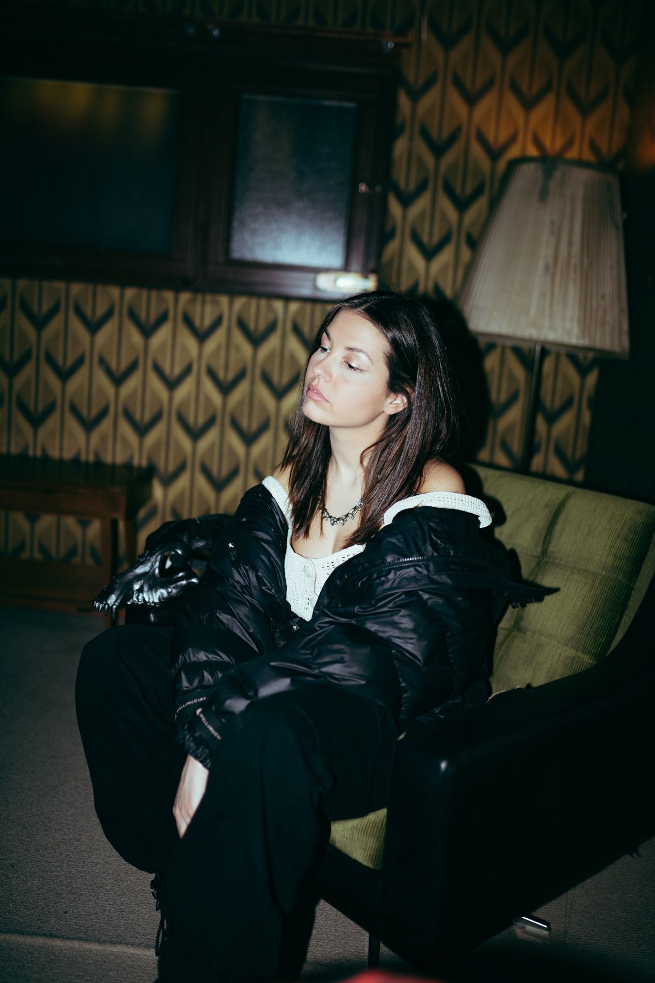 Sensu sitting in a chair