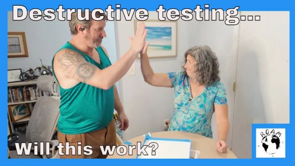 Thermal imaging camera capturing heat distribution during induction cooktop testing on a composite boat countertop.