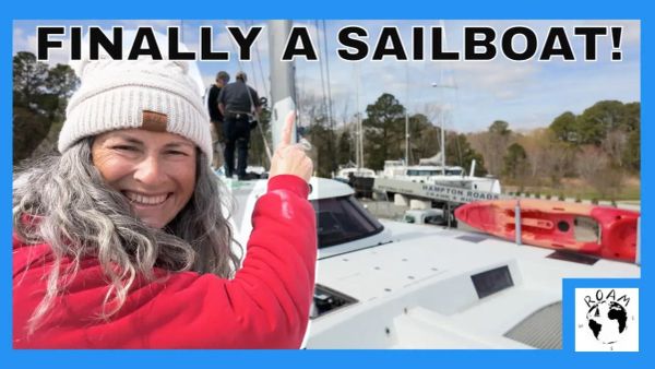 New stainless steel turnbuckles being tested against rigging terminals during sailboat mast preparation.