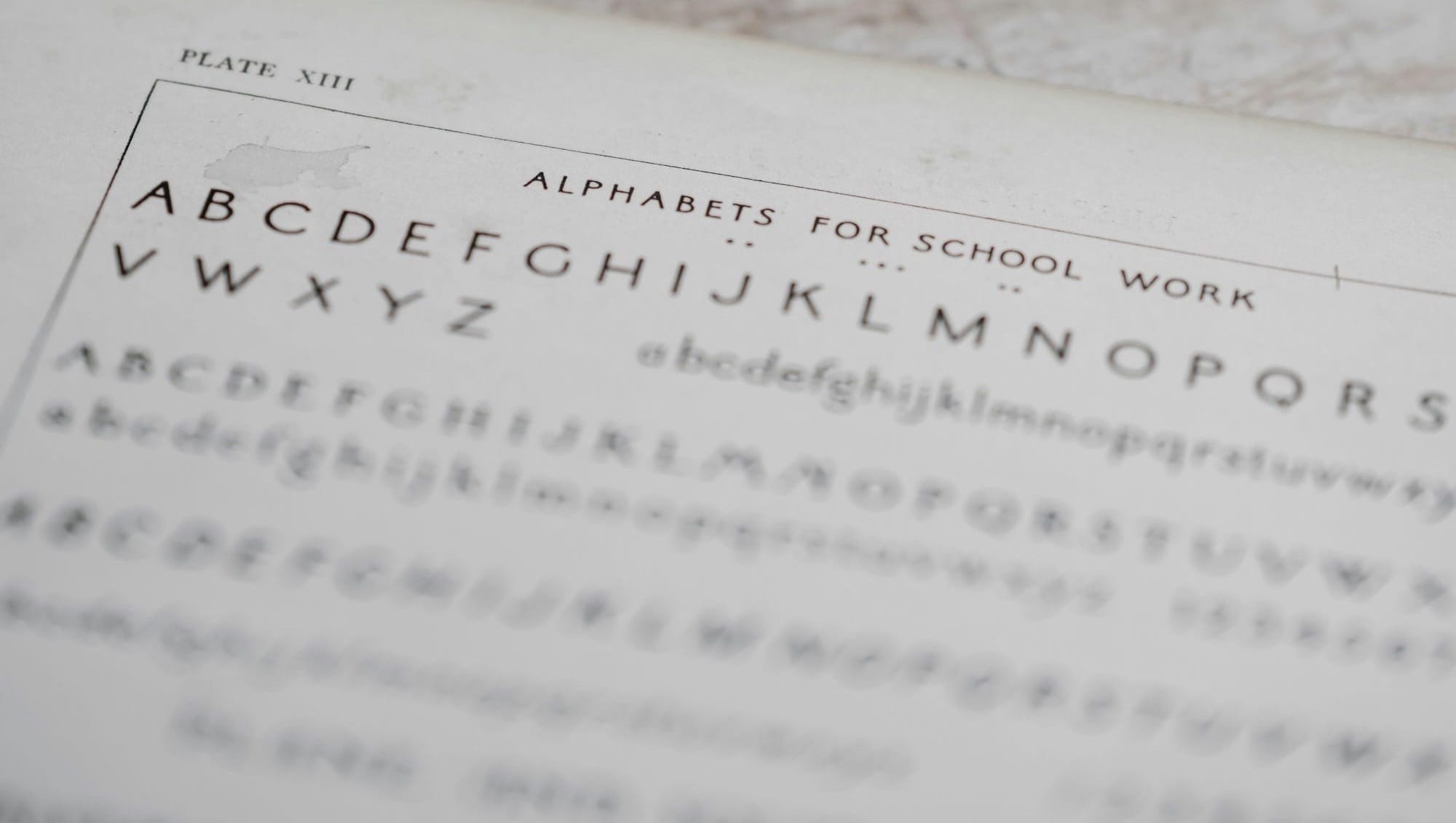 alphabets for school work on table
