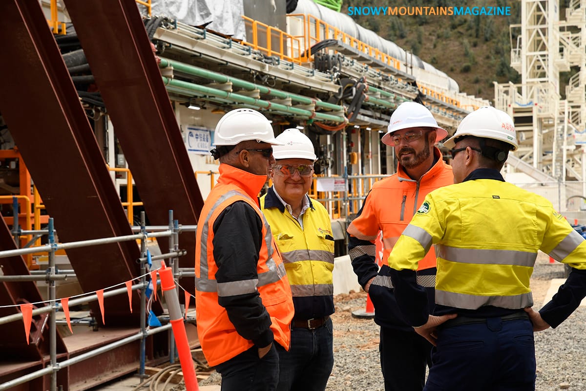 Snowy Hydro's Paul Broad and Kieran Cusack (orange) and Future Generation's Antonio Betti and Marco Assorati.