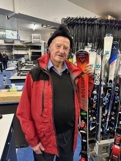 BACK TO BULLER: Paul Delves at George's Ski Hire while talking with Rob Aivatoglou.