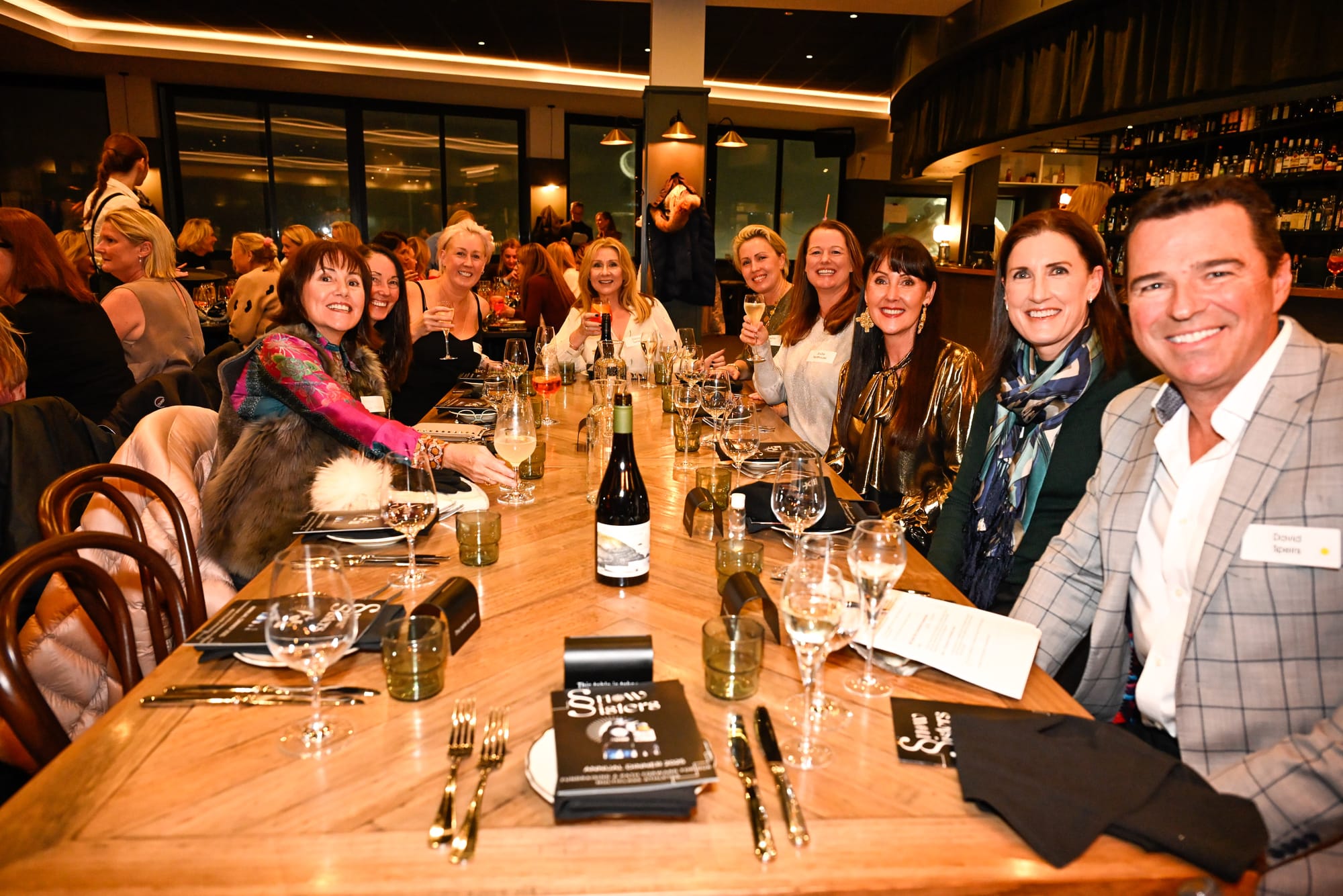 ONE BRAVE MAN: David Speirs, auctioneer, was delighted to be surrounded by ladies.