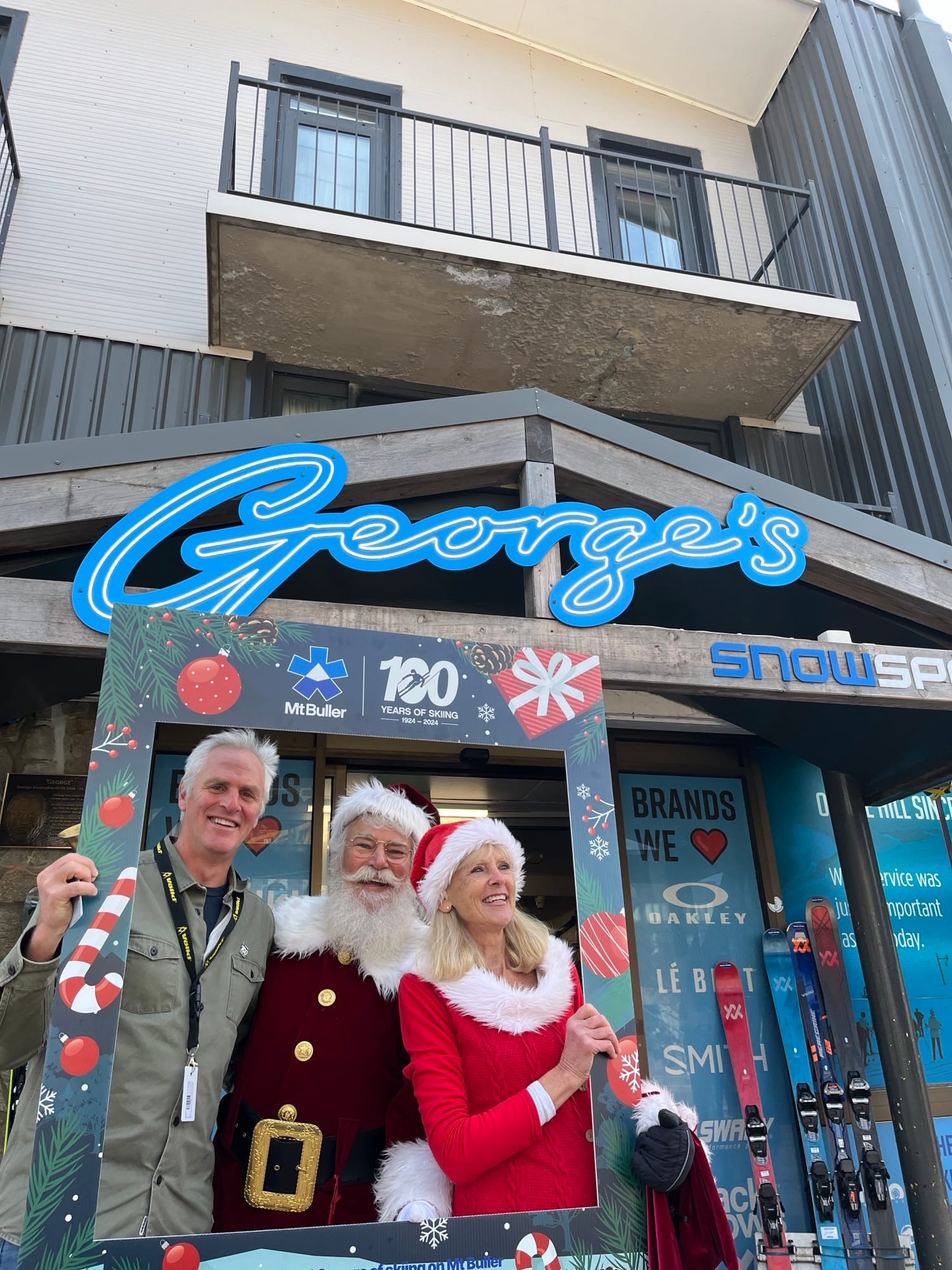 MERRY AND BRIGHT: (from left)  Rob Aivatoglou with Neil and Keryn Bower
A K A SantaMelbourne and Mary.Christmas. PHOTO: Supplied