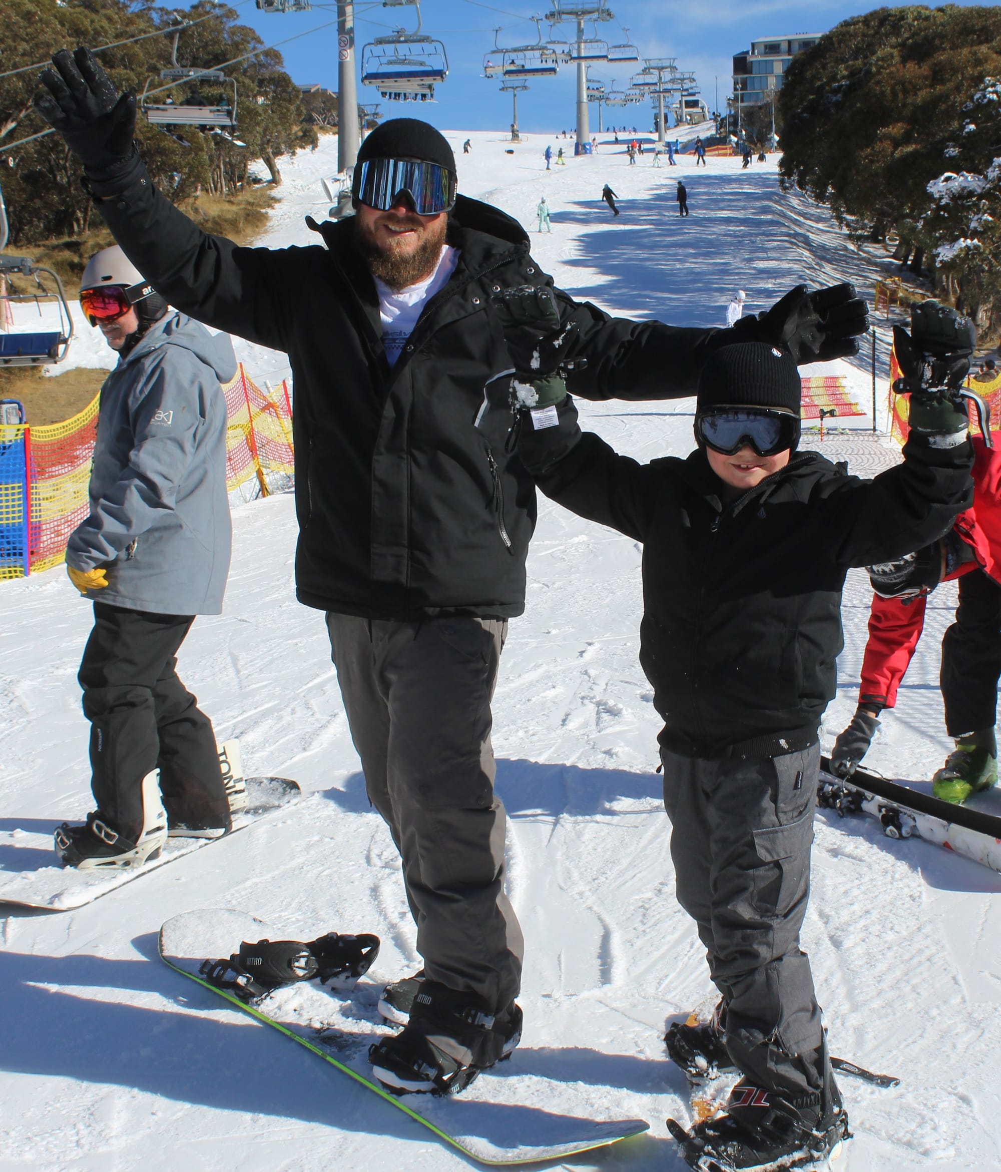 CELEBRATING 75 YEARS: Snowboarding duo Jason Clay and Morgan Clay from the Sunshine Coast. PHOTO: Trinity Knight
