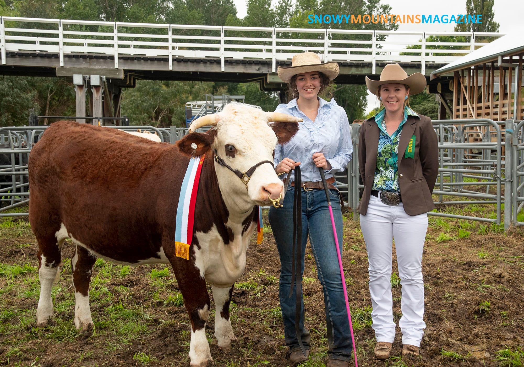 Grace Burns from Nimmitabel and judge Sarah Nesbitt (right) in the supreme champion beef stud cattle section.