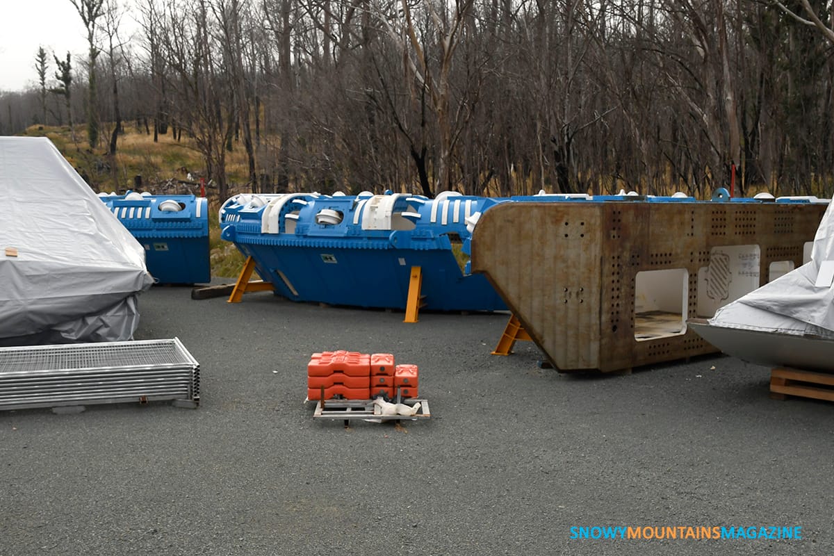 Parts of another TBM in temporary storage on the side of the road.