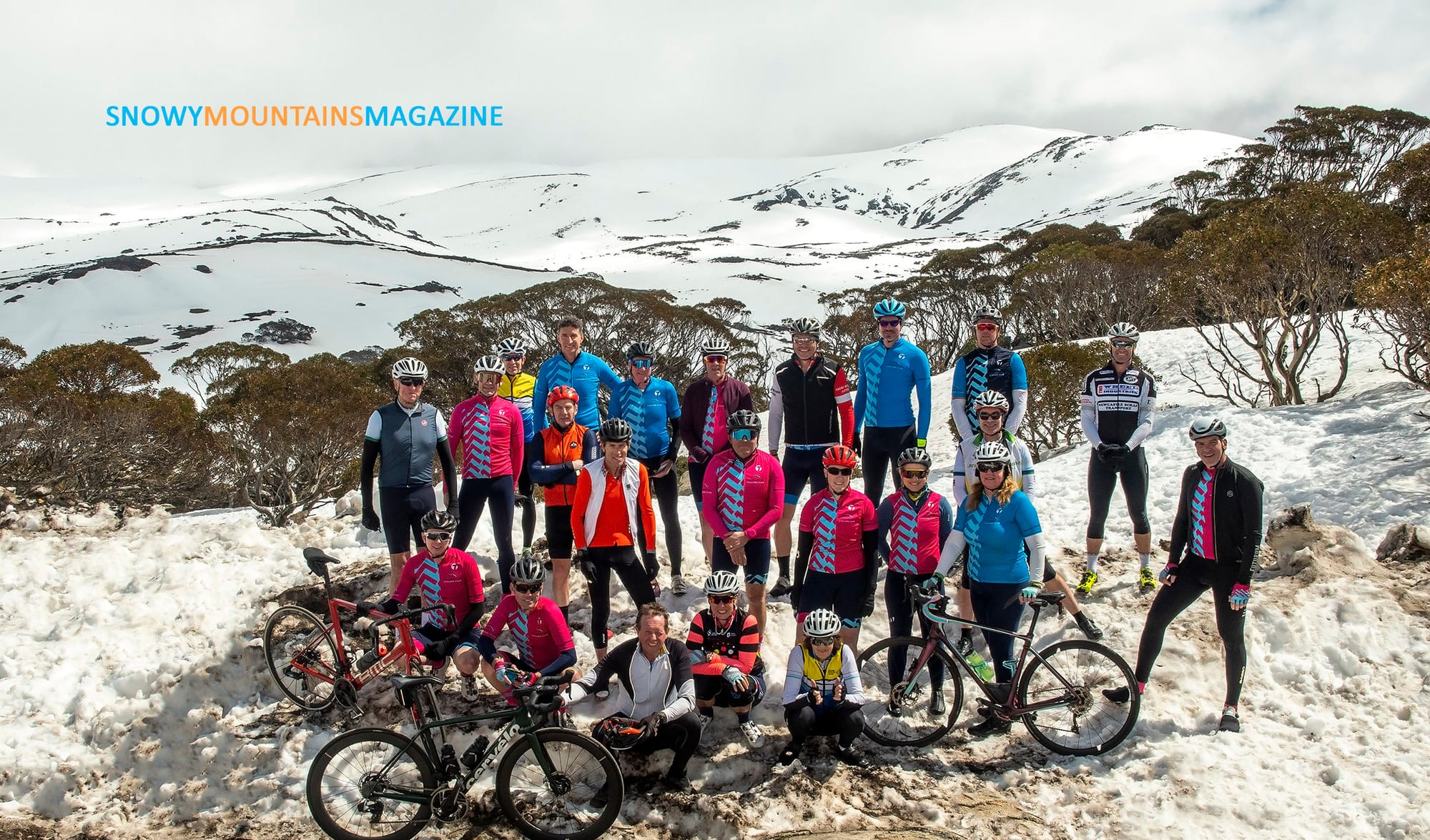 The Jindabyne Cycling Club and guest riders at Charlotte Pass lookout.