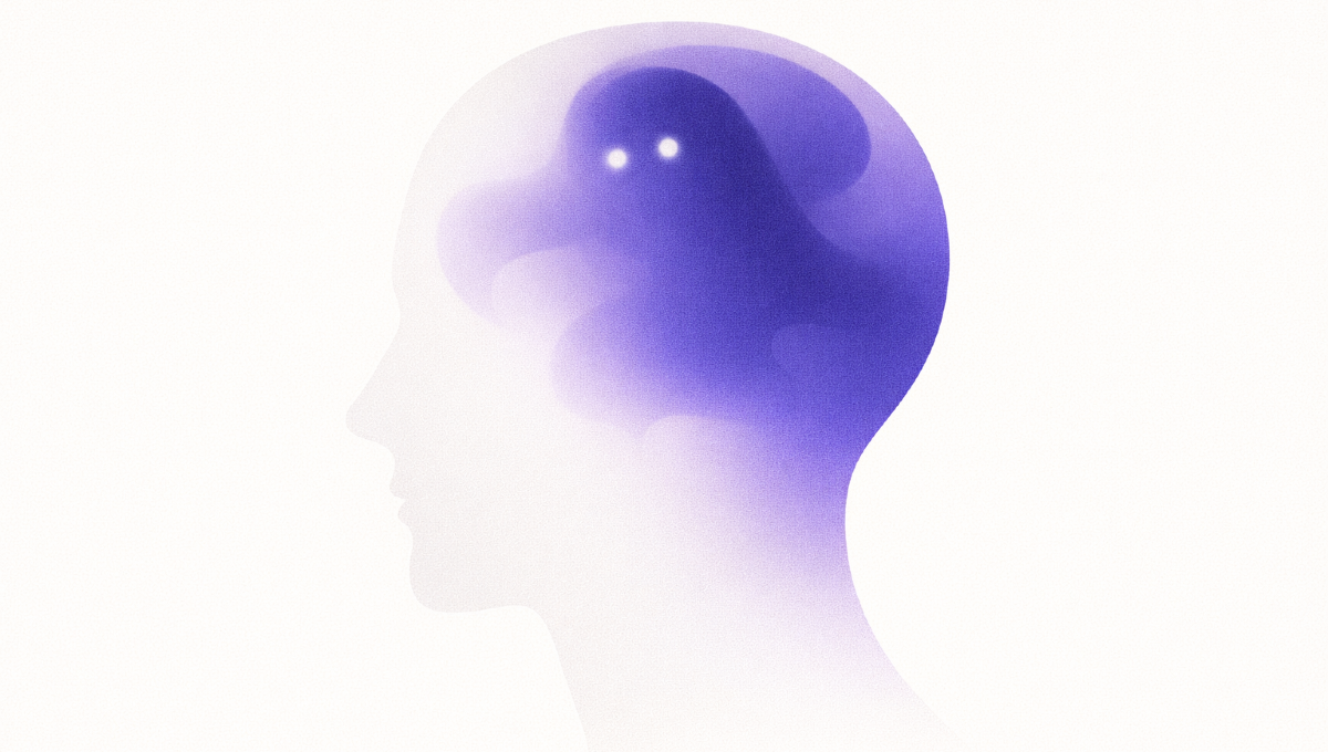 Profilo di testa umana con cervello illuminato in viola - apofenia e pattern matching nel cervello