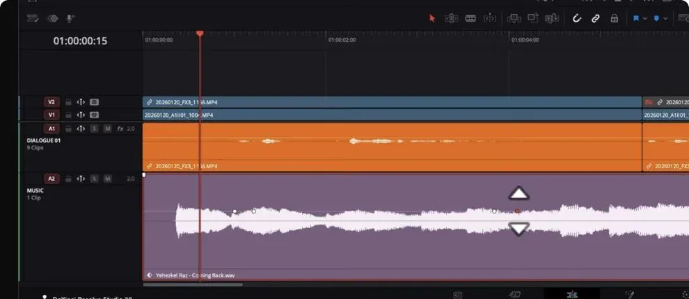 DaVinci Resolve Studio 20 Edit timeline with dialogue above music and manual volume keyframes on the music waveform
