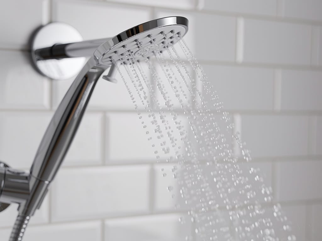 Modern shower head filter for hard water in a clean bathroom