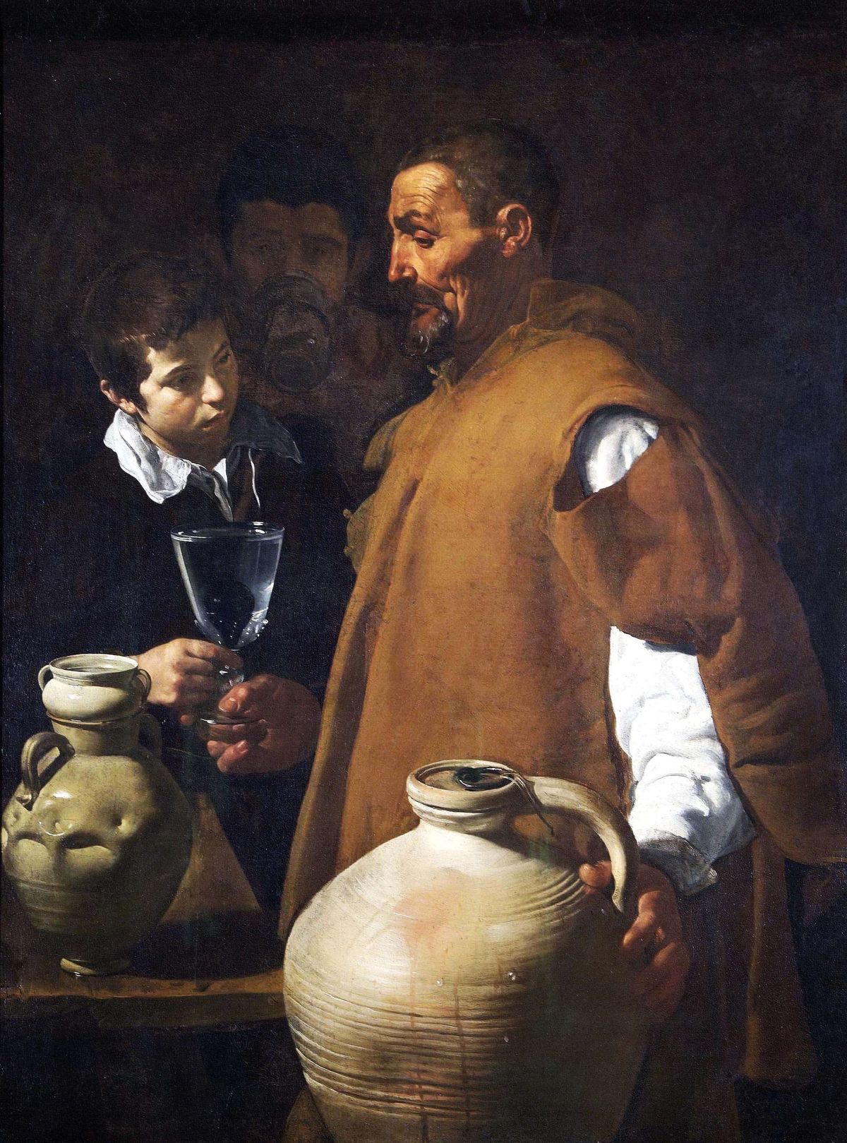 Velázquez, The Waterseller of Seville: an old man hands a glass of water to a boy, beside two large clay jars.