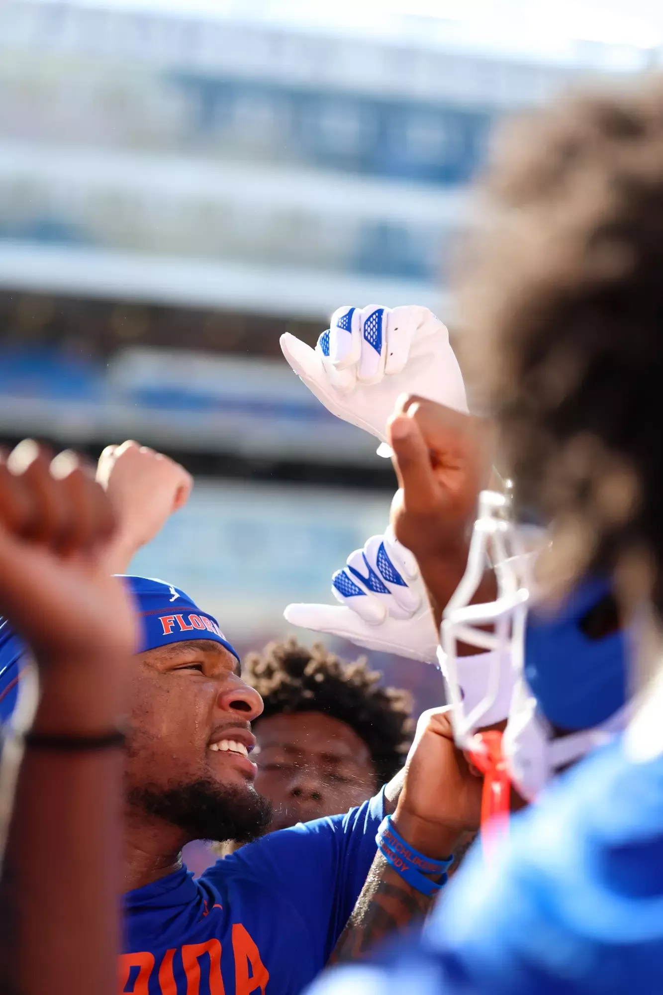 Florida Gators players huddle before a game at Ben Hill Griffin Stadium