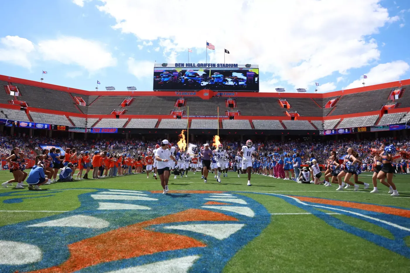 Jon Sumrall leads the Florida Gators onto the field at Ben Hill Griffin Stadium