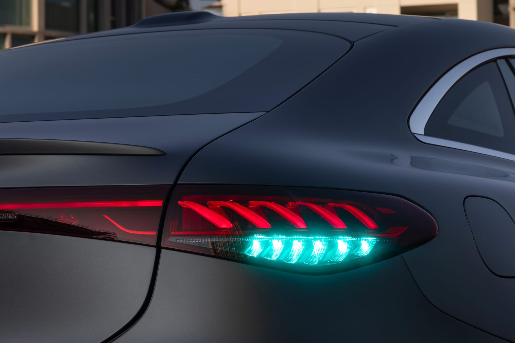 A Mercedes-Benz EQS with Drive Pilot and cyan lights