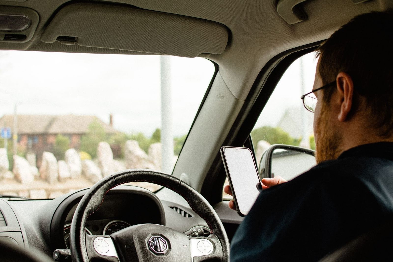 Half of this state’s motorists admit to using their phones while driving post image
