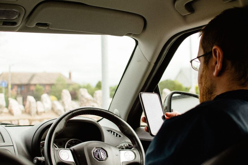 Half of this state’s motorists admit to using their phones while driving post image