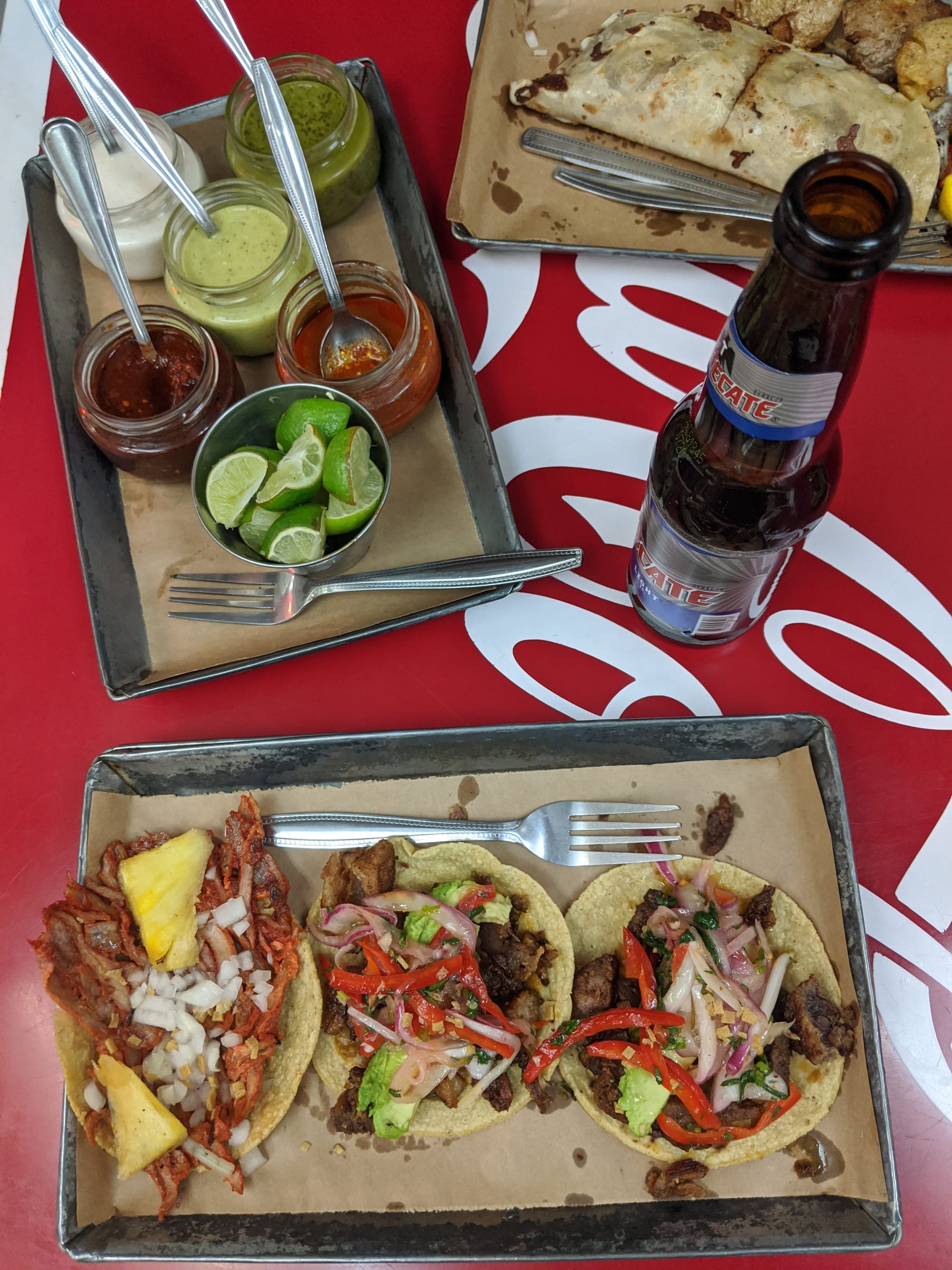 Tacos and a drink at a popular taquería in CDMX