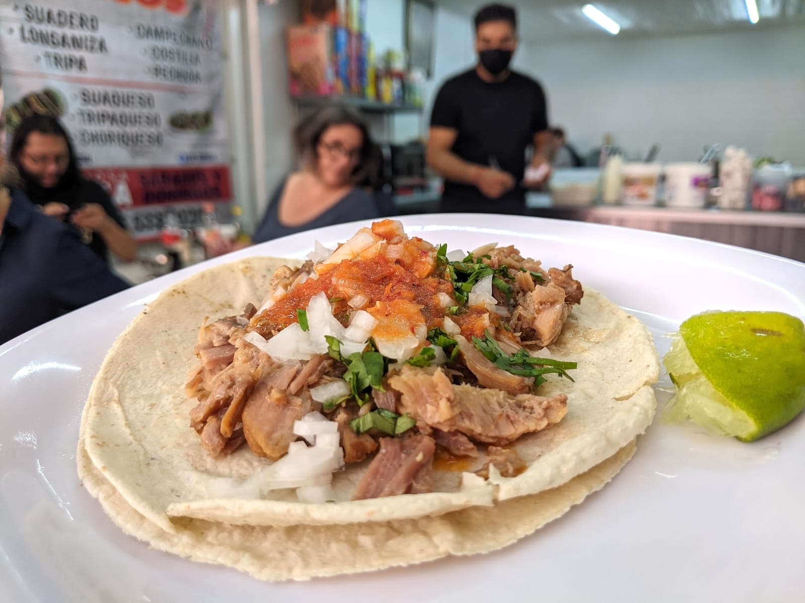 Street taco on a plate at a Mexico City market
