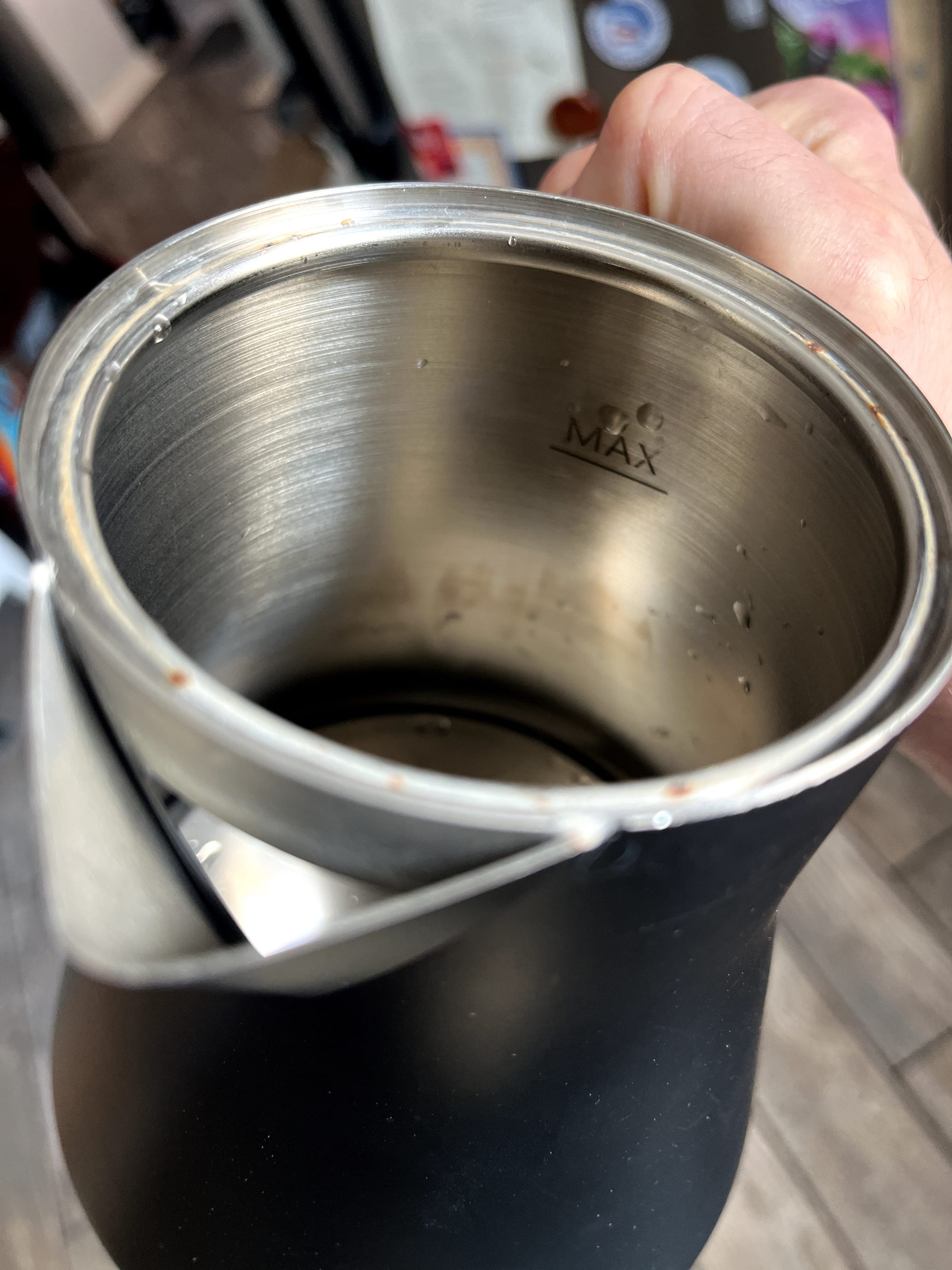 A clean kettle with just a twinge of brownish discoloration on the side wall.