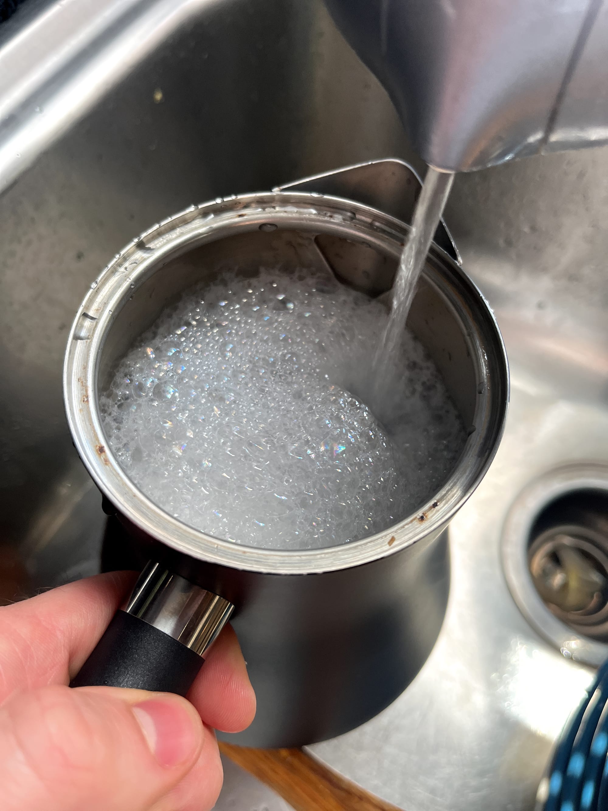 A kettle being reset with descaler solution.