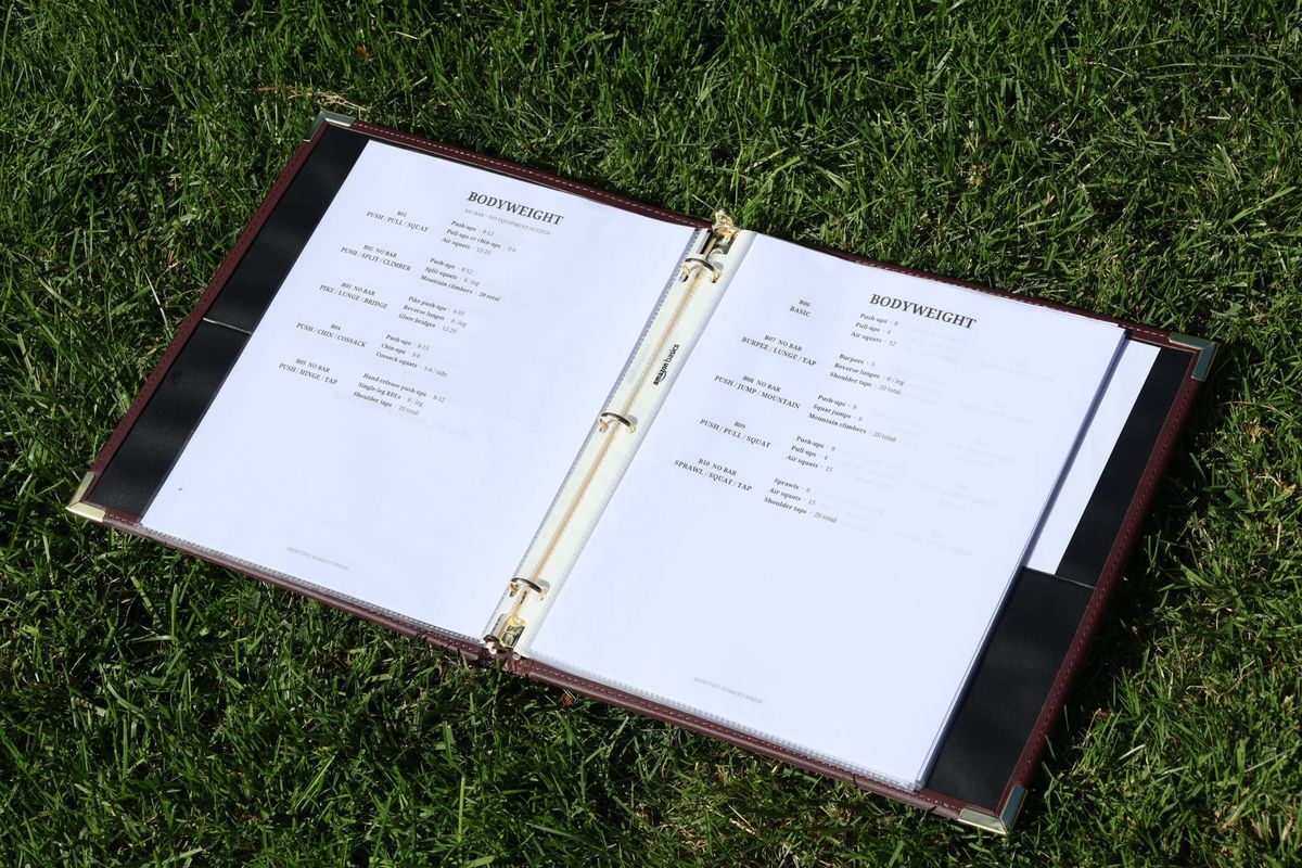 My workout binder in grass