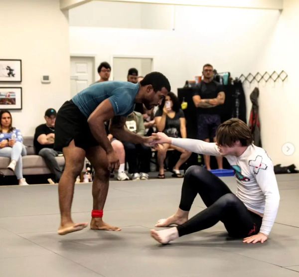 Me competing at the Theory Invitational Showcase Jiujitsu Event