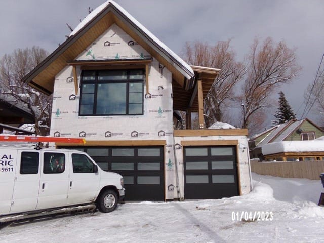 The garage and apartment at the alley under construction on Jan. 4, 2023. City staff judged its height against the limits for a main house because the old house in front was supposed to come down. (Routt County Assessor’s Office)