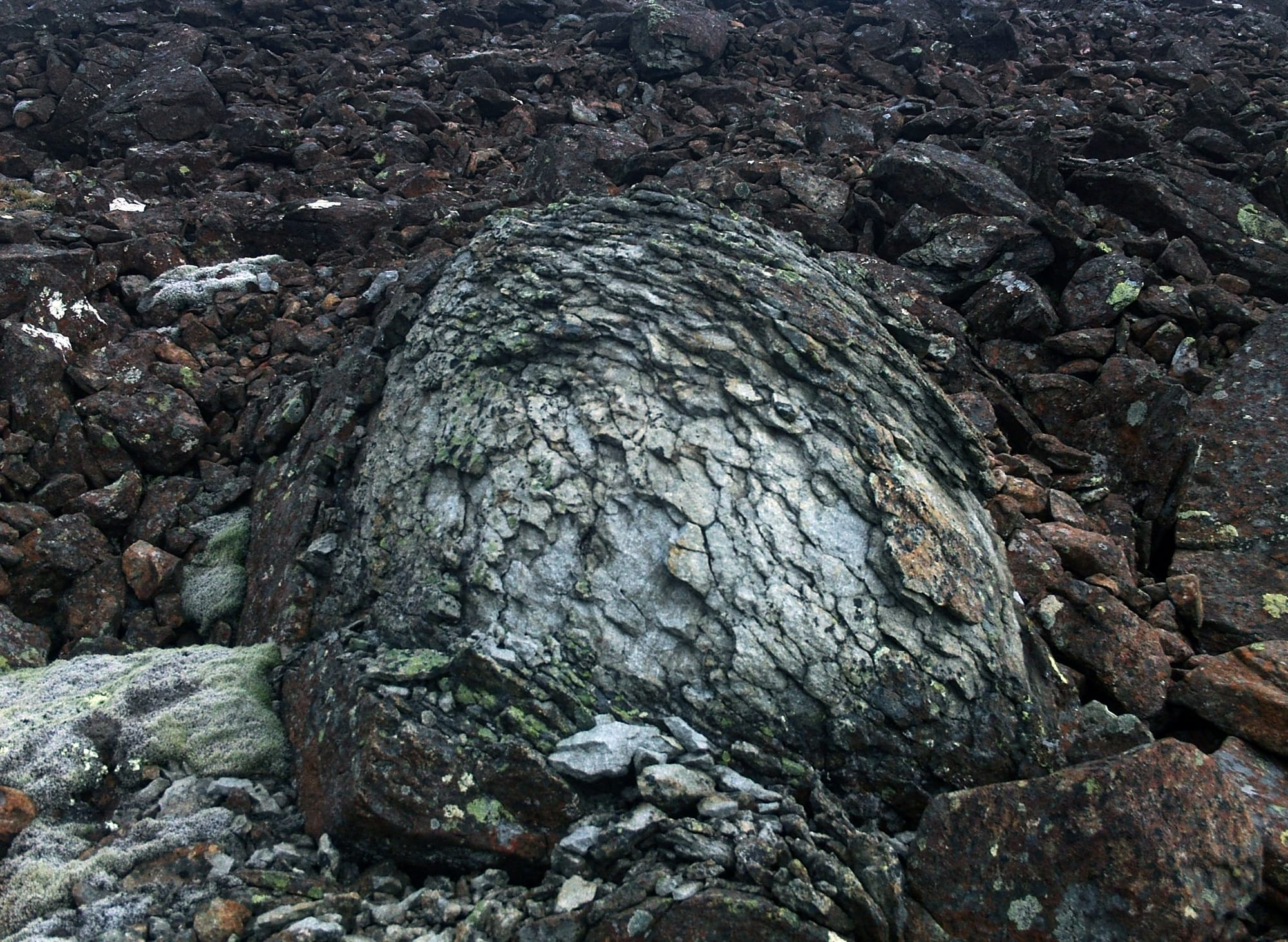 Spalling boulder.
