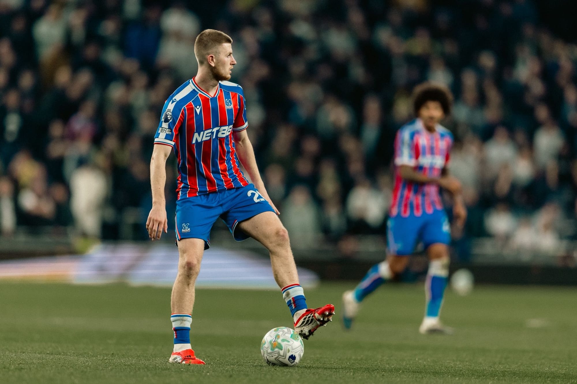 Photo of Adam Wharton receiving the ball for Crystal Palace against Tottenham Hotspur