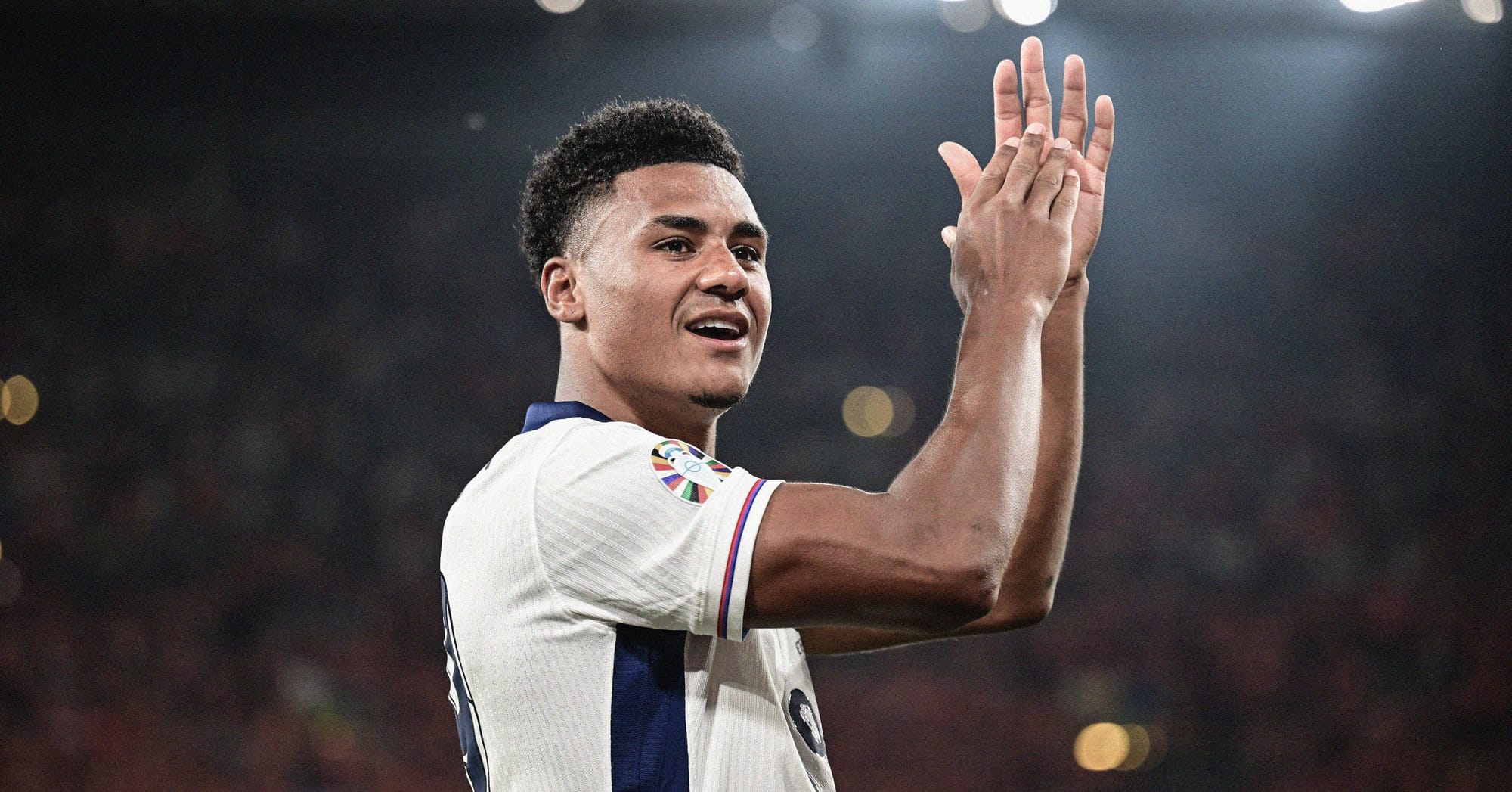 A photo of Ollie Watkins clapping England fans after scoring a last-minute winner in the smi-final at EURO 2024 