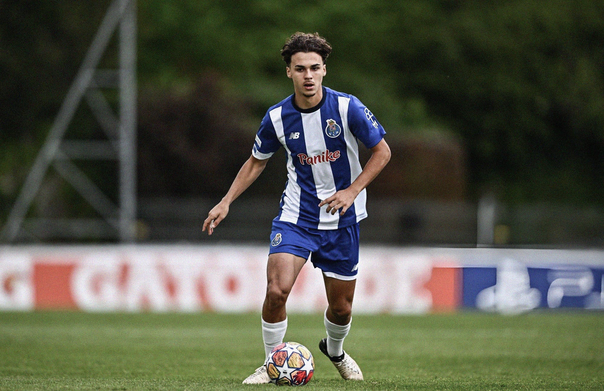 A photo of Porto's João Teixeira on the ball in a UEFA Youth League semi-final