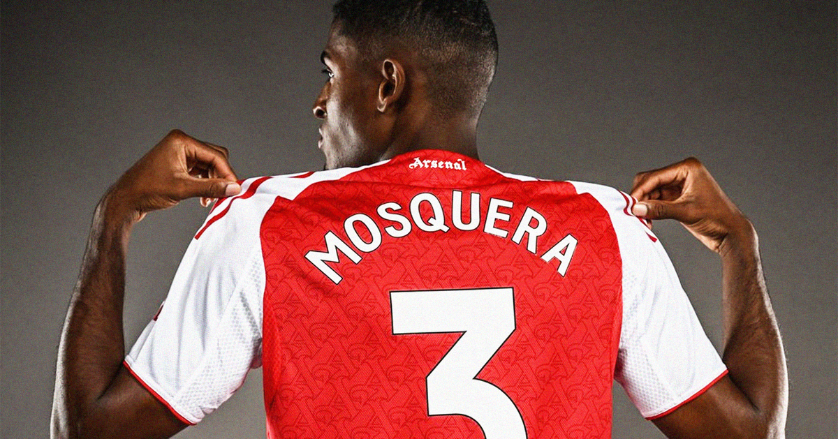 Cristhian Mosquera holding up the shoulders of his Arsenal shirt, showing 'MOSQUERA 3' on the back, at his official presentation