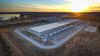 An aerial view of a Google Cloud data center in Iowa at sunset or sunrise, it's tough to tell.