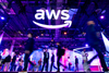 Attendees walk the expo floor at AWS re:Invent 2023.