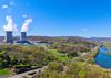 Two cooling towers release steam into the sky at the Susquehanna nuclear power plant in Pennsylvania.