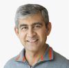a headshot of ServiceNow president, chief product officer, and chief operating officer Amit Zavery