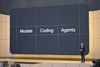 Google CEO Sundar Pichai speaks on stage Tuesday at Google I/O in front a slide that reads "models, coding, agents."