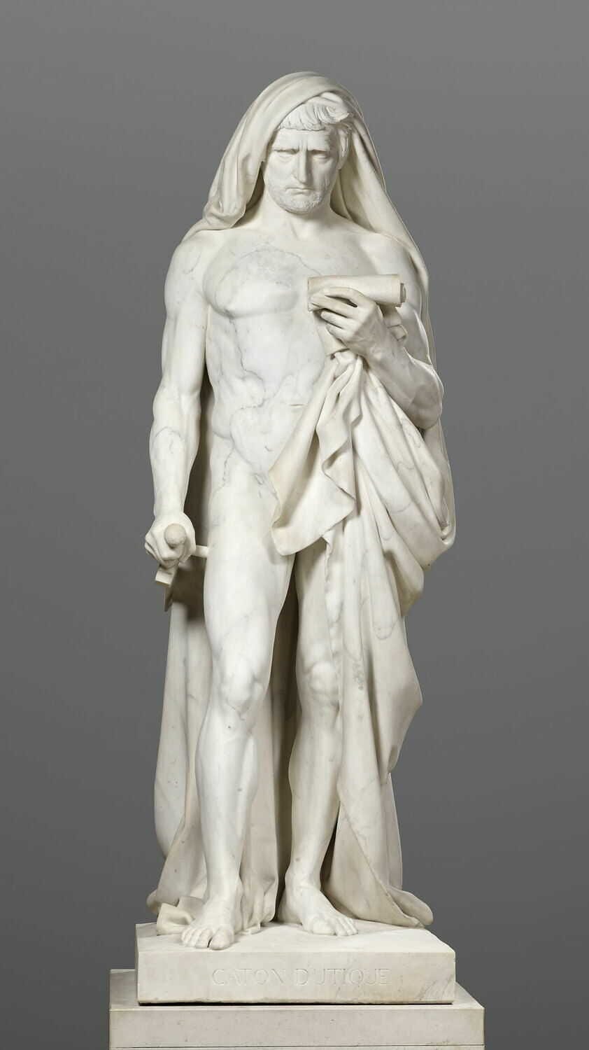 Cato the Younger’s famous statue displayed in the Louvre, where he reads Plato’s Phaedon, before his death