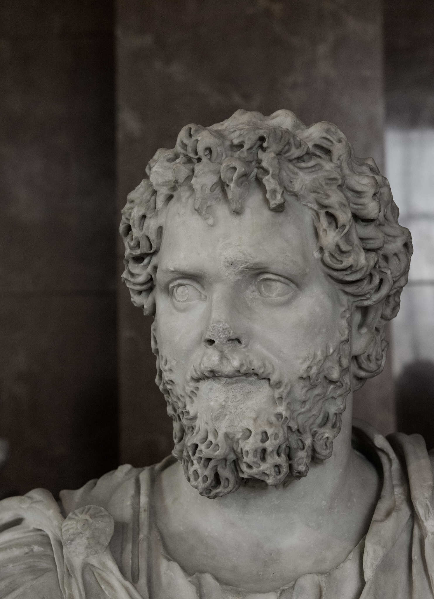 Septimius Severus portrayed as Serapis, the god to which the emperor liked to be compared, carved in the Antonine stylistic fashion