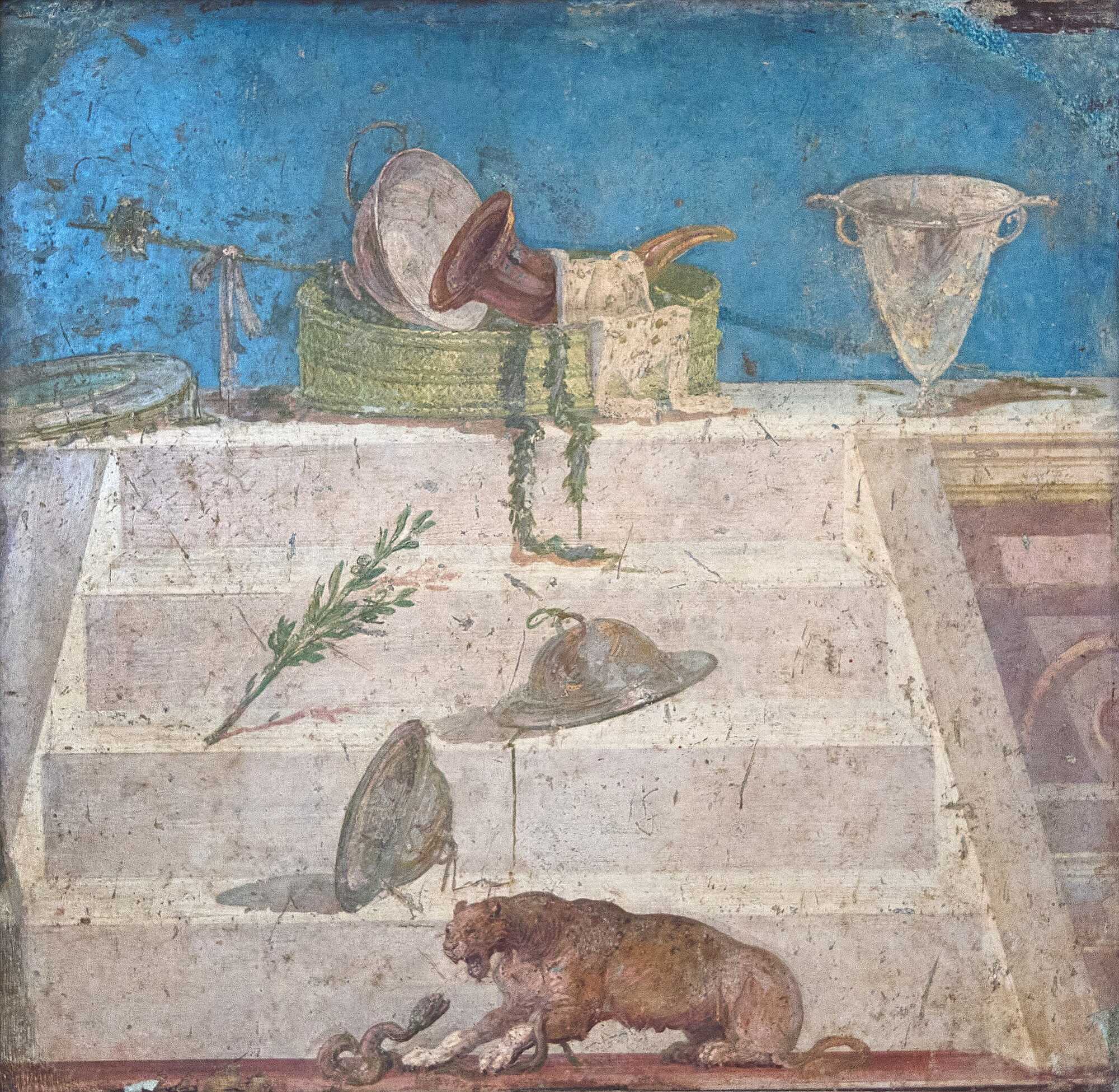 A fresco depicting Dionysiac symbols (panther, tambourine, cista with a rhython, cup of wine), from Pompeii