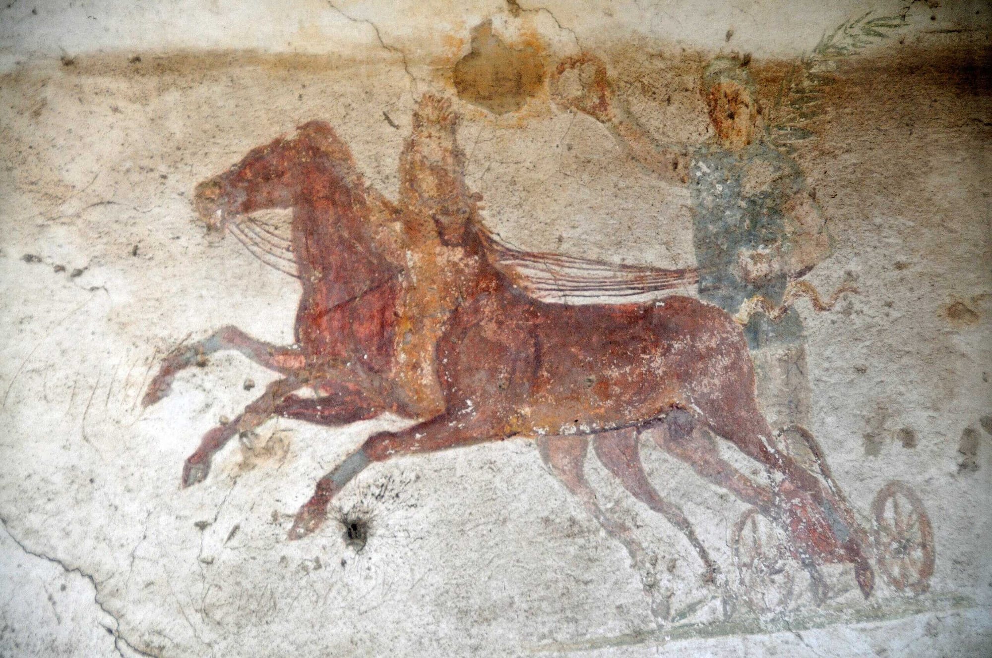 A fresco from the Roman House of the Charioteers in Ostia Antica